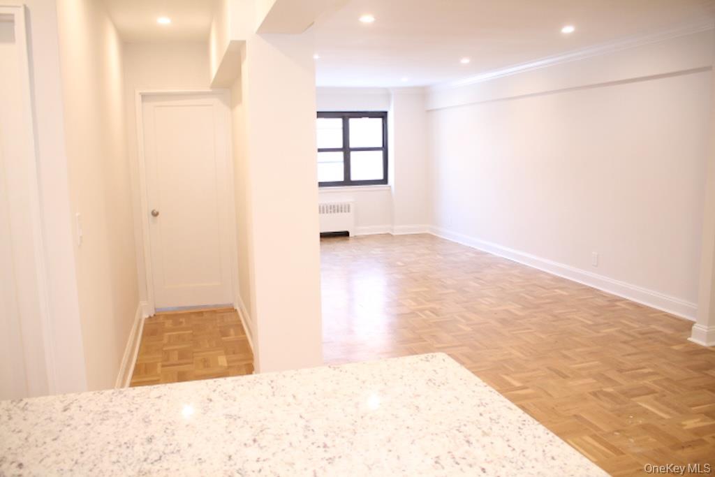 50 White Oak Street, Unit 1C New Rochelle, NY 10801 - Photo 19 of 24 an empty room with windows