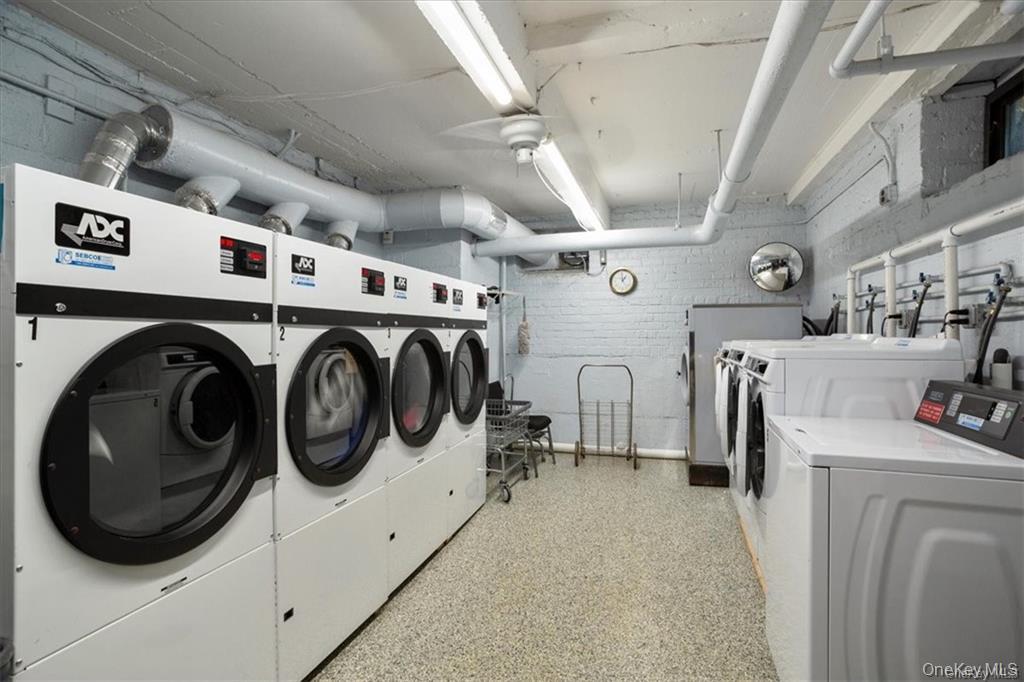 50 White Oak Street, Unit 1C New Rochelle, NY 10801 - Photo 21 of 24 a utility room with dryer and washer