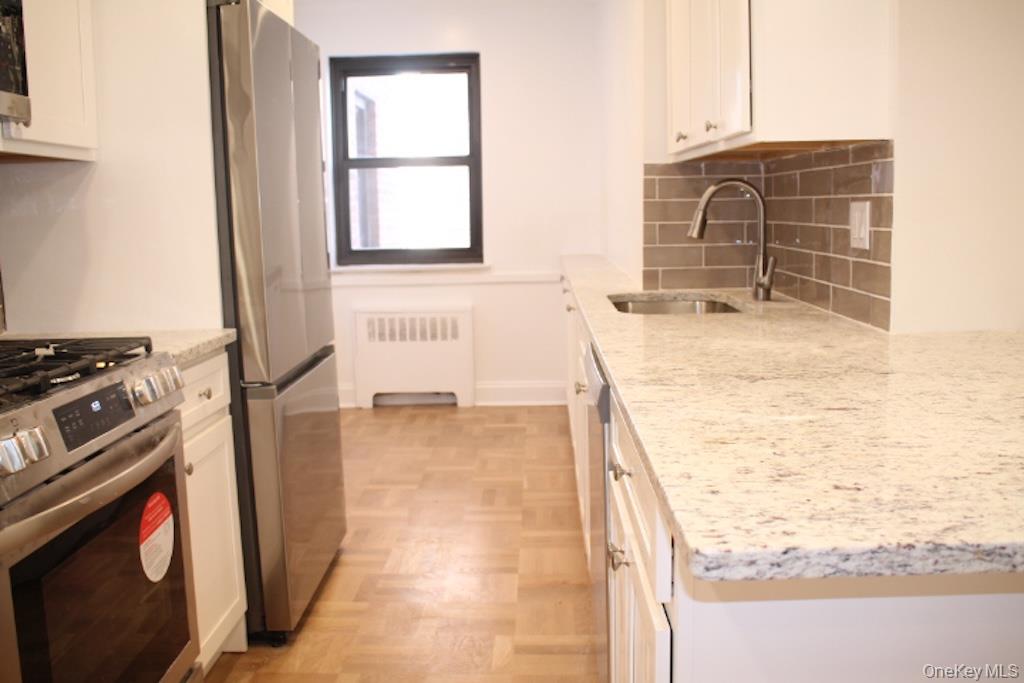 50 White Oak Street, Unit 1C New Rochelle, NY 10801 - Photo 7 of 24 a view of a kitchen storage and a sink