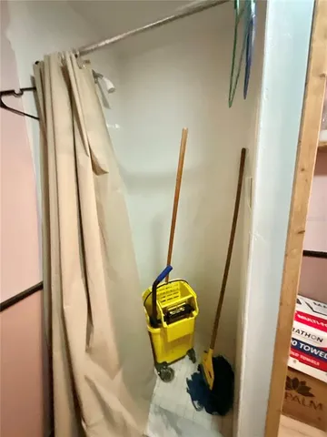 a lobby with furniture and potted plant