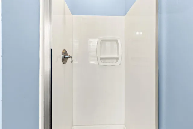 a view of a street with a bench