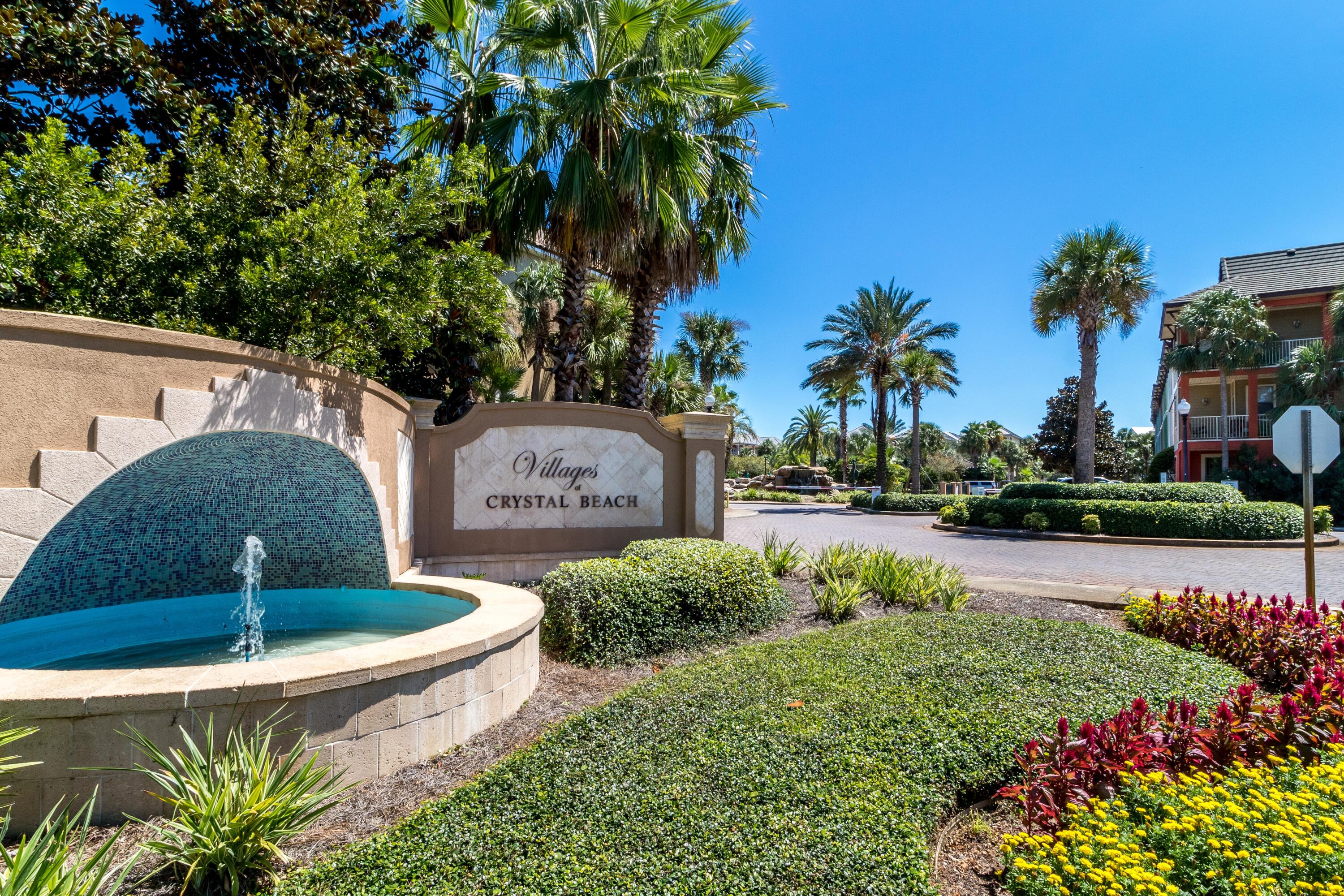 207 Kono Way Destin, FL 32541 - Photo 42 of 45 a front view of a house with garden