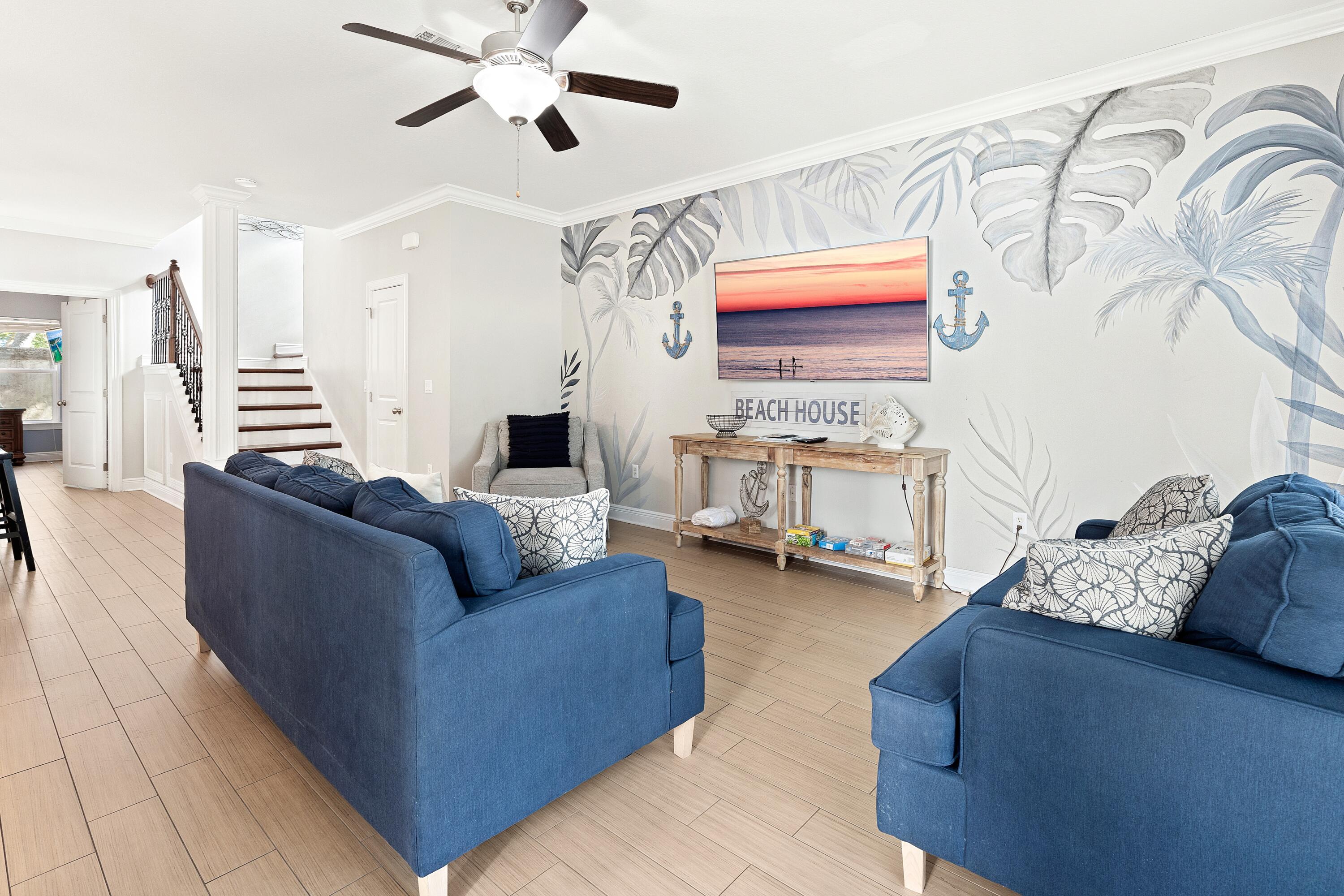 207 Kono Way Destin, FL 32541 - Photo 6 of 45 a living room with furniture and a fireplace