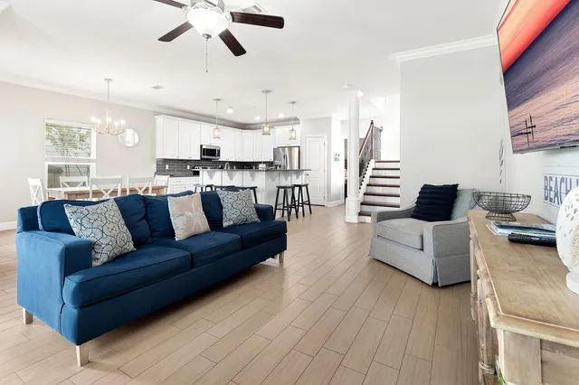 a view of living room with furniture and a large window