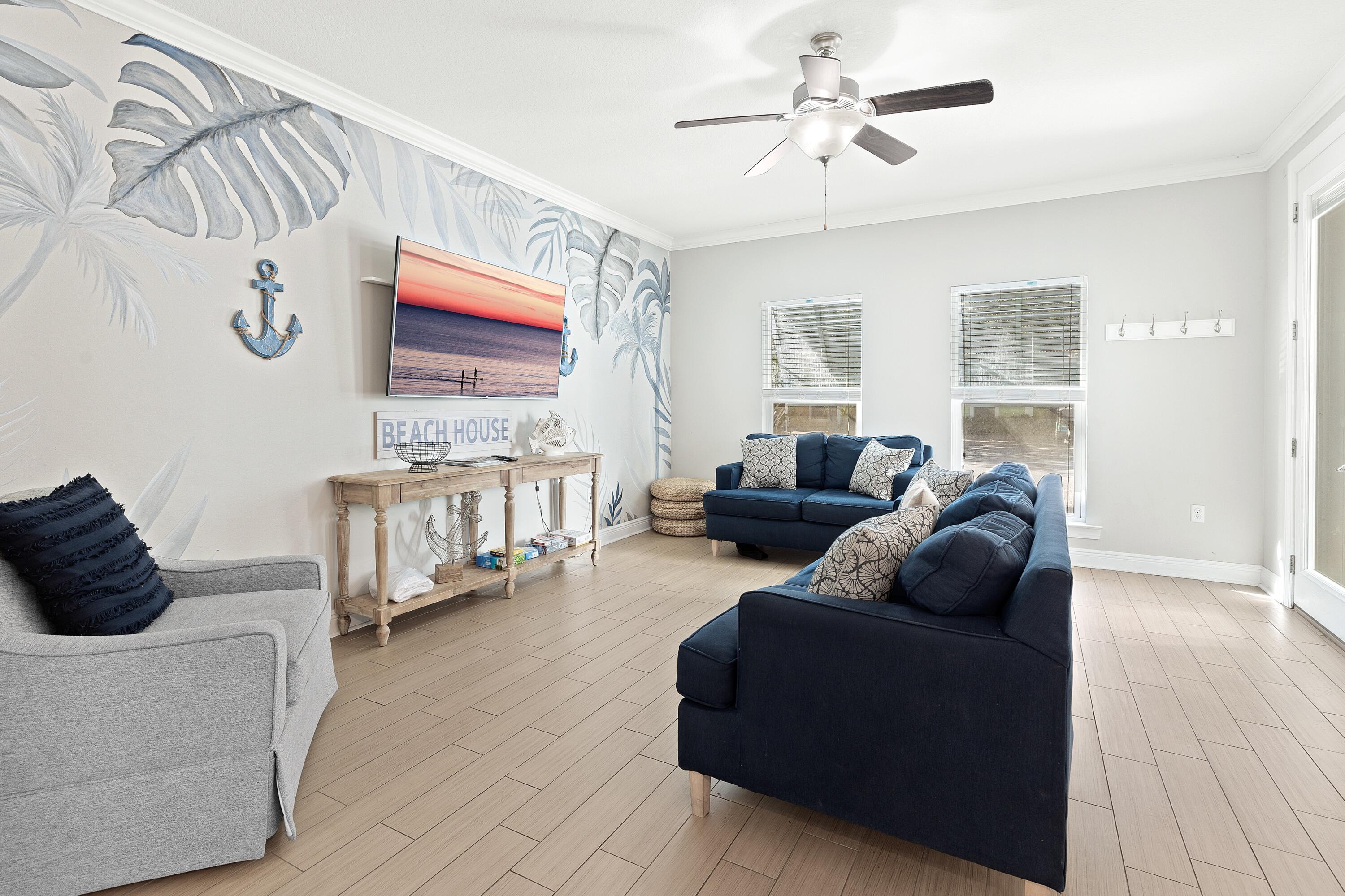 207 Kono Way Destin, FL 32541 - Photo 9 of 45 a living room with furniture and a flat screen tv
