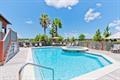 12 Lafitte Boulevard Gulf Shores, AL 36542 - Photo 4 of 9 Sunset Bay Pool