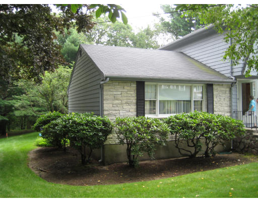 4 Ledgewood Road Woburn, MA 01801 - Photo 2 of 13 a view of a house with a garden