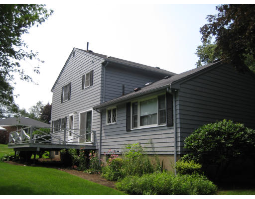 4 Ledgewood Road Woburn, MA 01801 - Photo 4 of 13 a view of a house with a yard