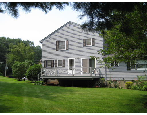 4 Ledgewood Road Woburn, MA 01801 - Photo 5 of 13 a view of a house with a backyard