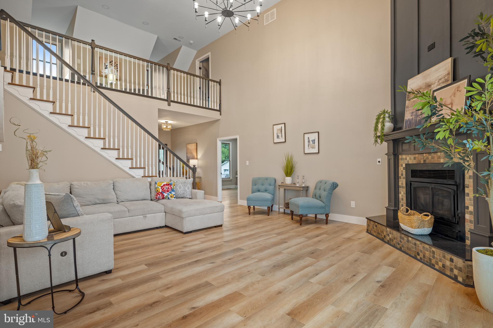 123 West Tomlin Station Road Mickleton, NJ 08056 - Photo 13 of 59 a living room with furniture and a fireplace