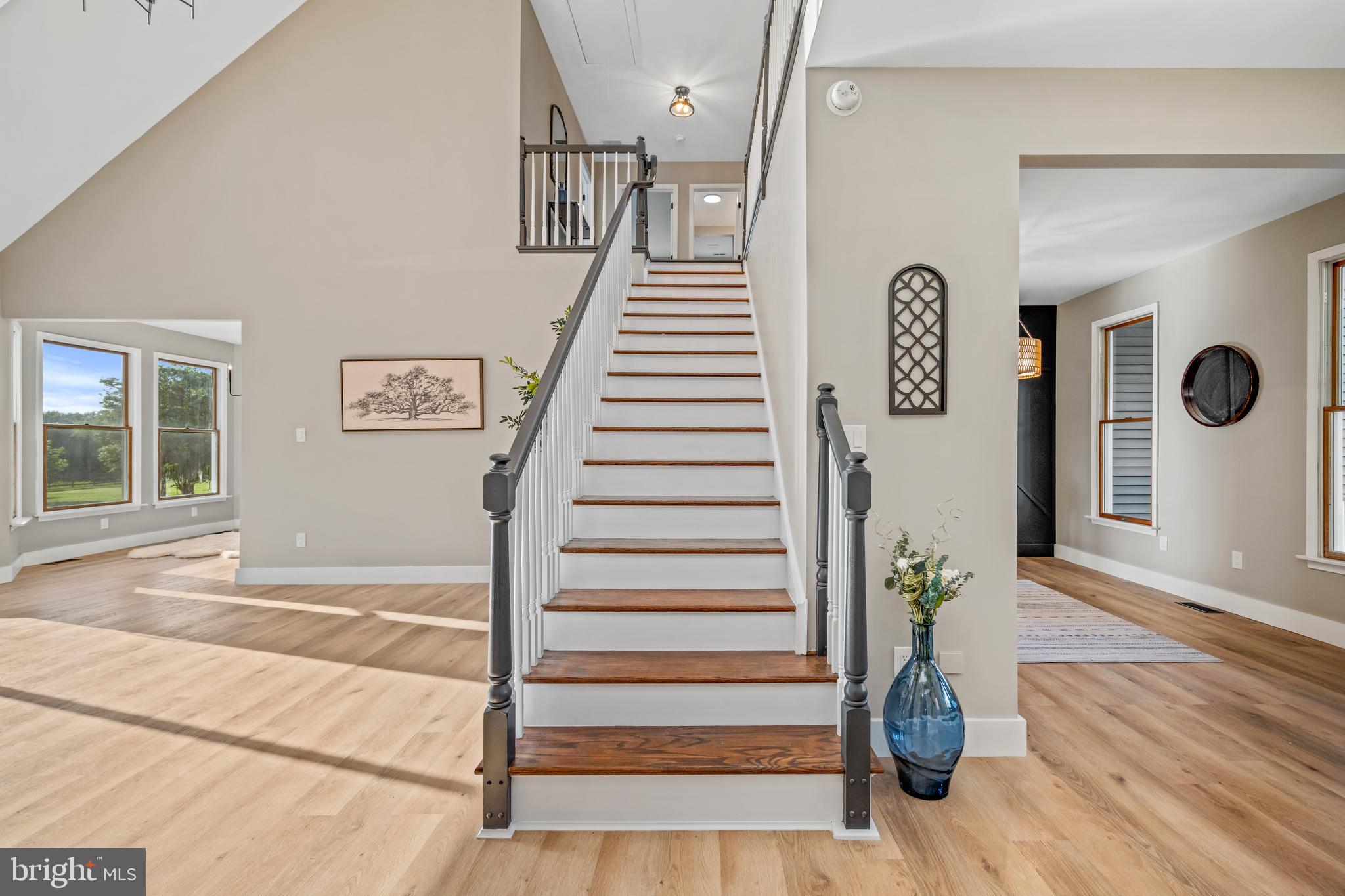 123 West Tomlin Station Road Mickleton, NJ 08056 - Photo 16 of 59 a view of entryway with stairs and wooden floor