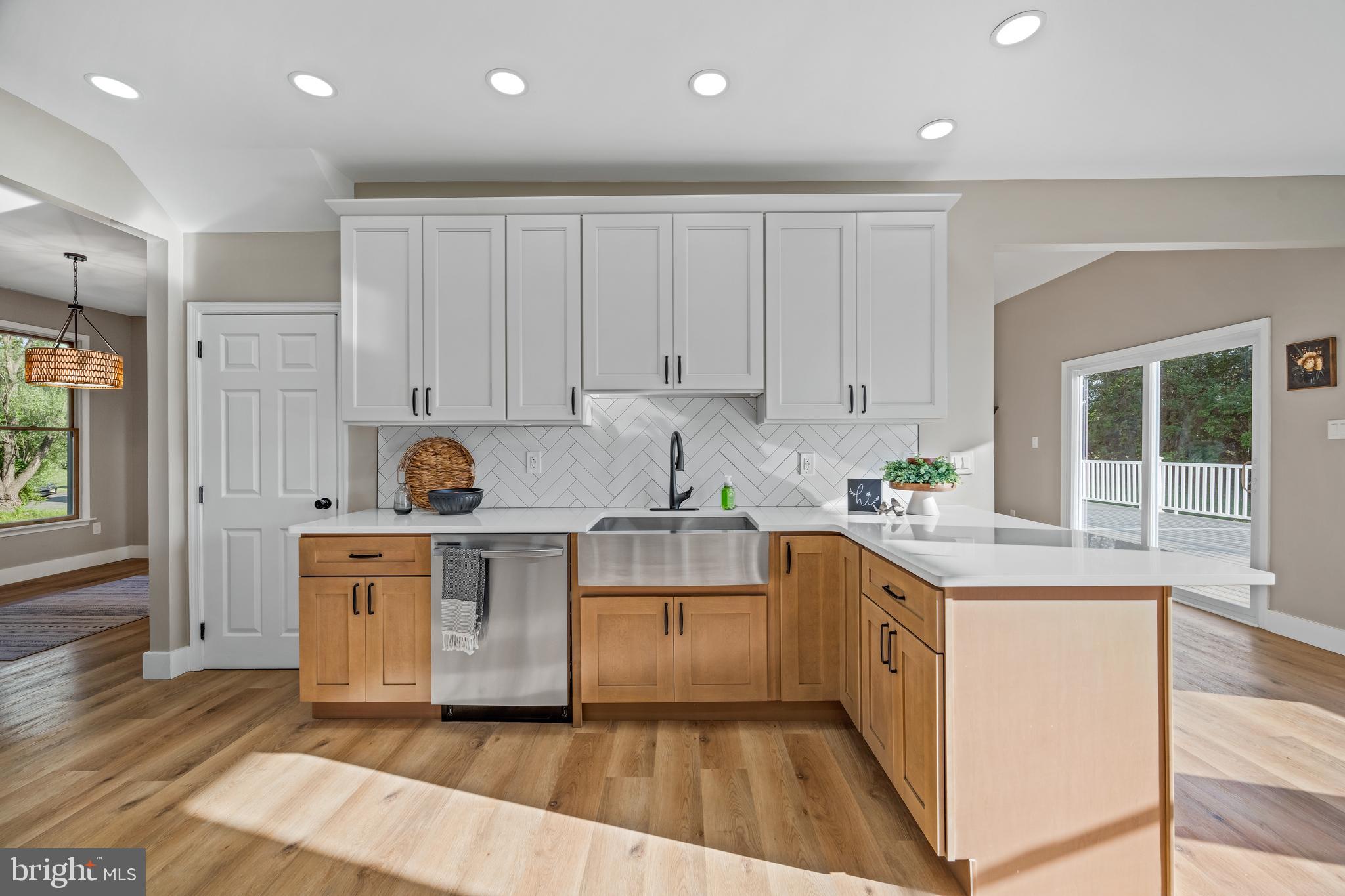 123 West Tomlin Station Road Mickleton, NJ 08056 - Photo 20 of 59 a kitchen with a stove top oven sink and cabinets