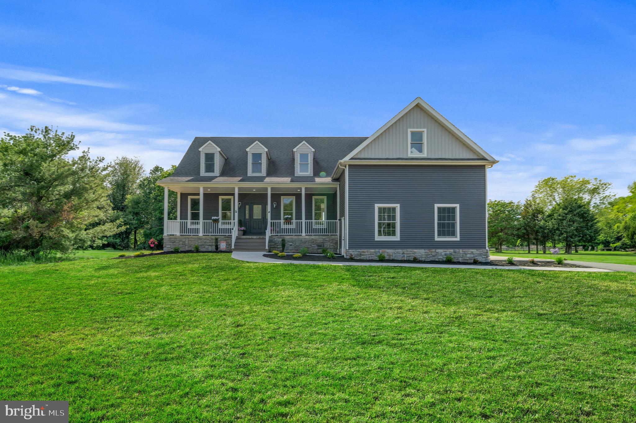 123 West Tomlin Station Road Mickleton, NJ 08056 - Photo 2 of 59 a front view of a house with a yard