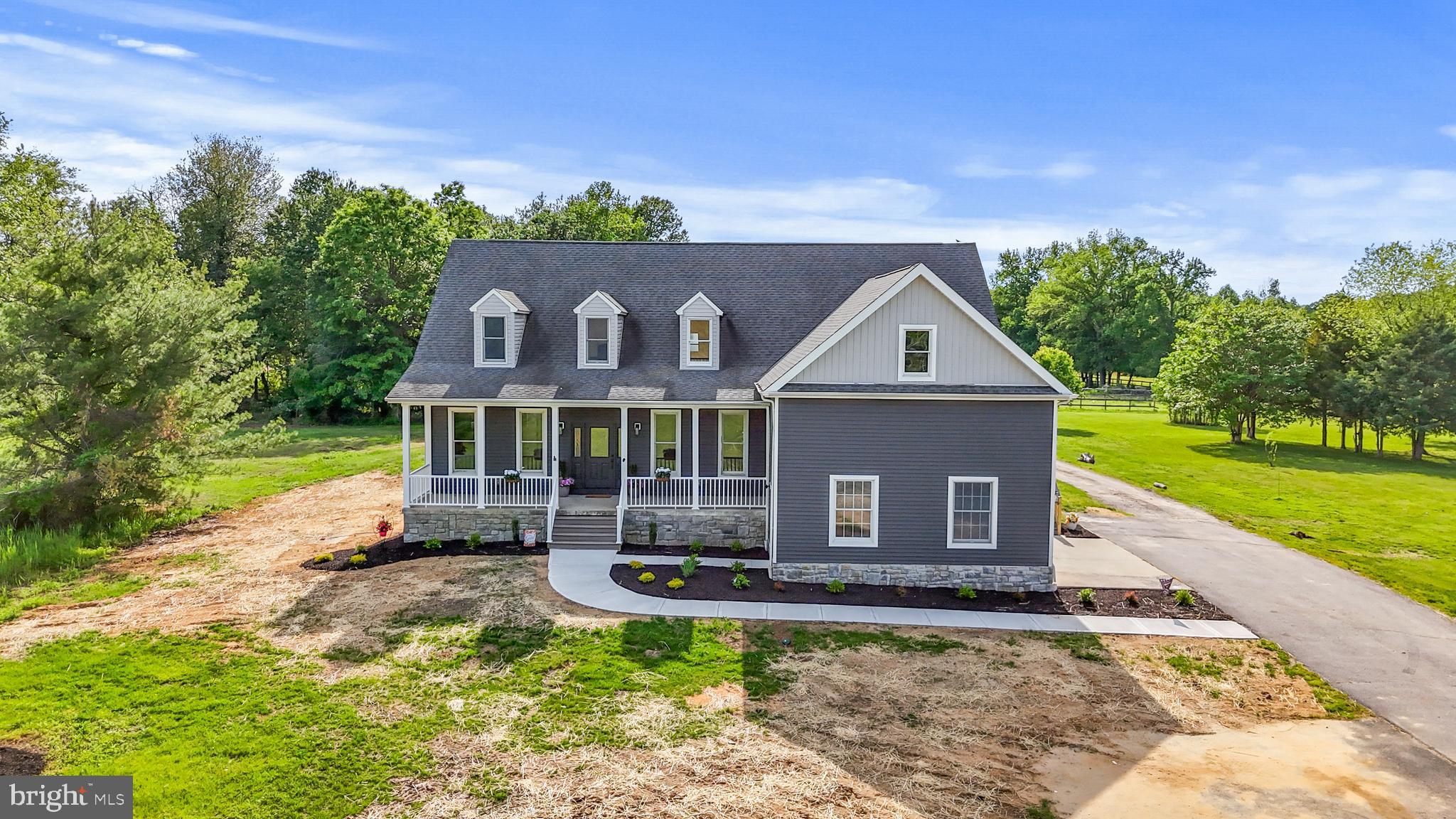 123 West Tomlin Station Road Mickleton, NJ 08056 - Photo 3 of 59 a front view of a house with a yard