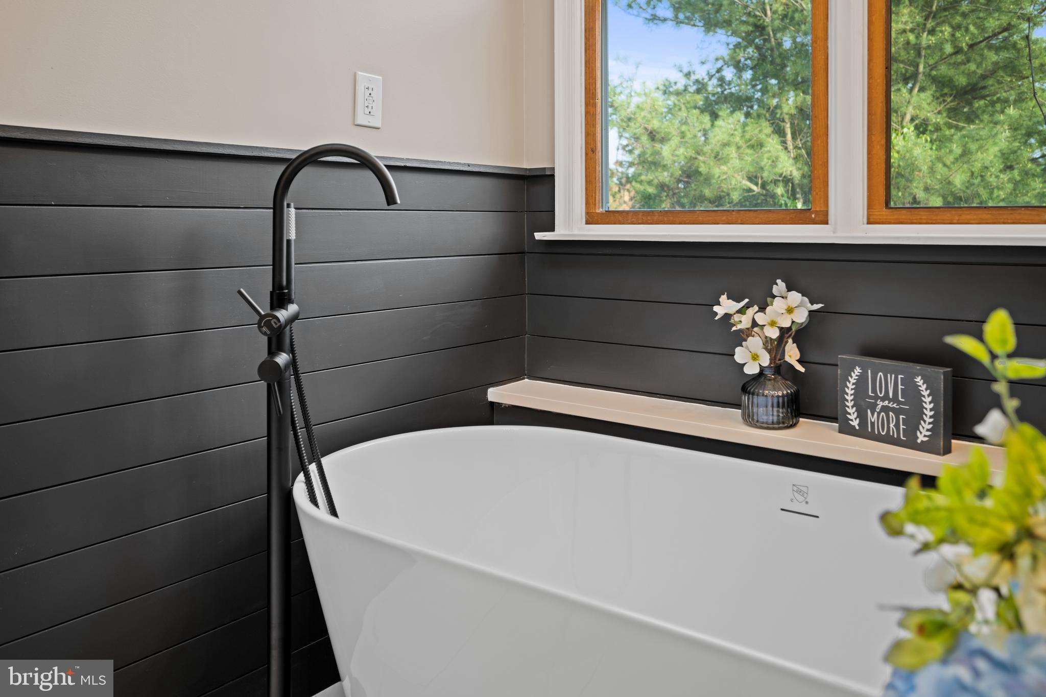 123 West Tomlin Station Road Mickleton, NJ 08056 - Photo 35 of 59 a bathroom with a sink a vanity and a potted plant