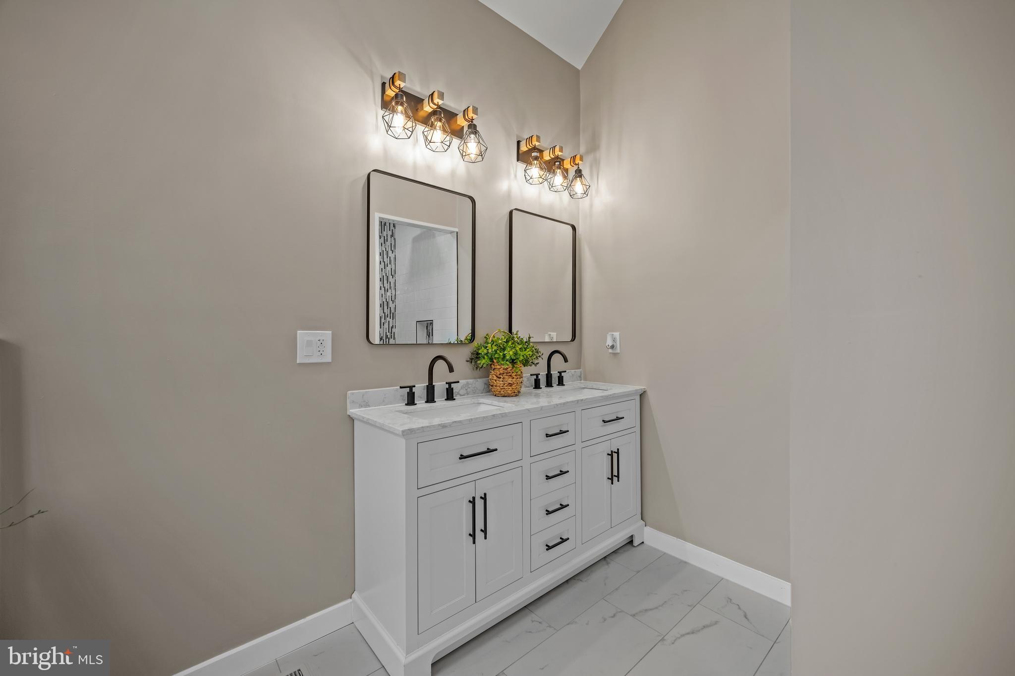 123 West Tomlin Station Road Mickleton, NJ 08056 - Photo 37 of 59 a bathroom with a sink mirror and vanity