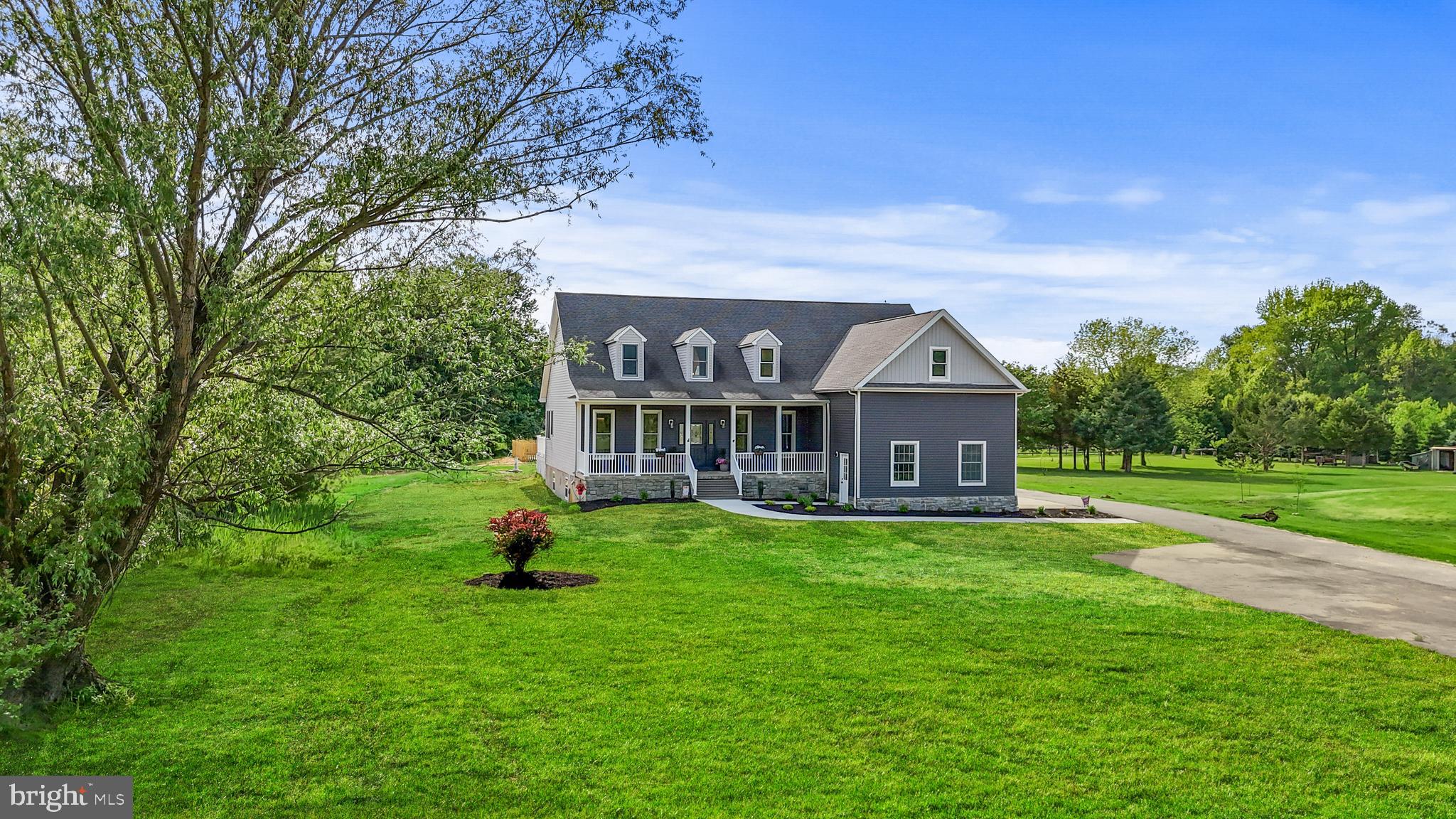 123 West Tomlin Station Road Mickleton, NJ 08056 - Photo 4 of 59 a view of a house with a big yard