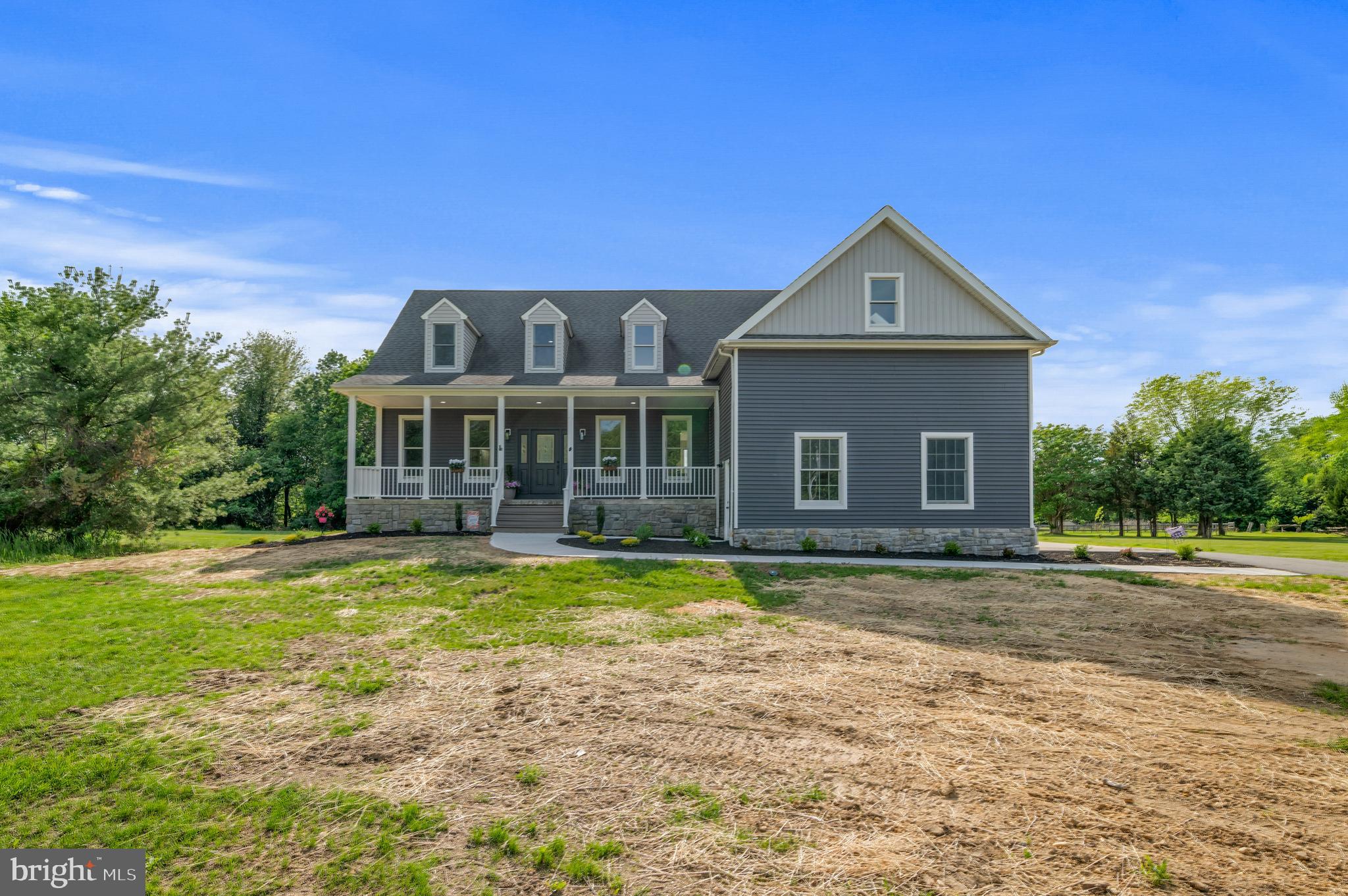 123 West Tomlin Station Road Mickleton, NJ 08056 - Photo 54 of 59 a front view of a house with a yard