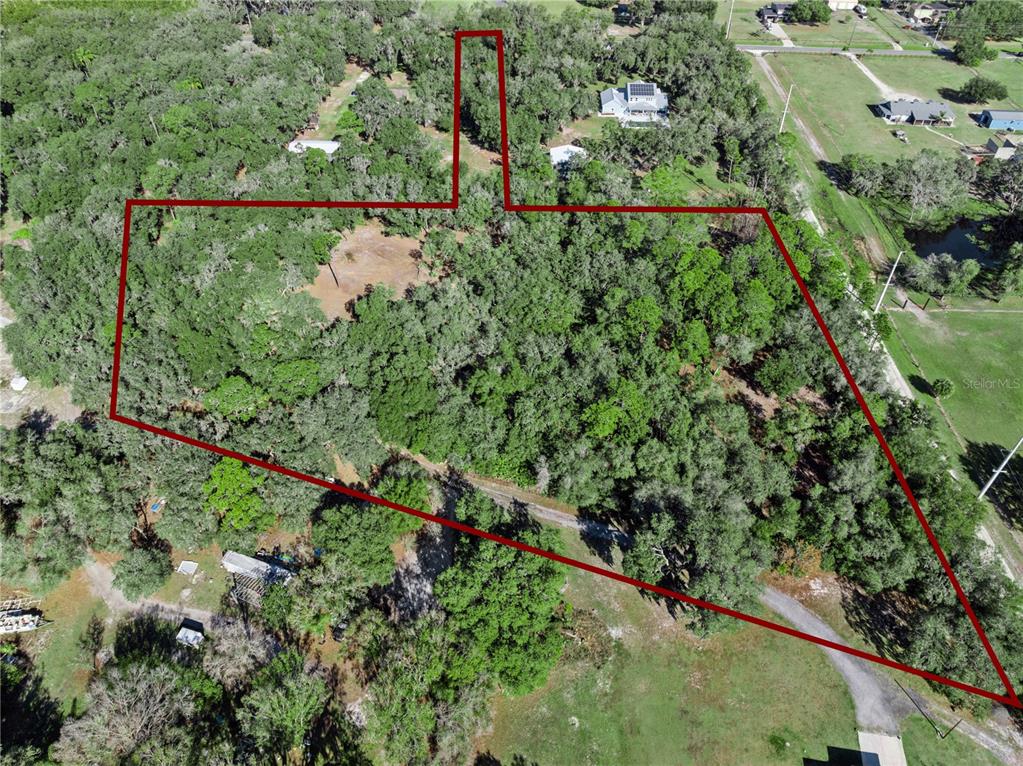 1001 Lake Harney Road Geneva, FL 32732 - Photo 2 of 34 an aerial view of mountain and tree