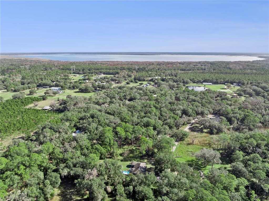 1001 Lake Harney Road Geneva, FL 32732 - Photo 27 of 34 an aerial view of a city with lots of residential buildings