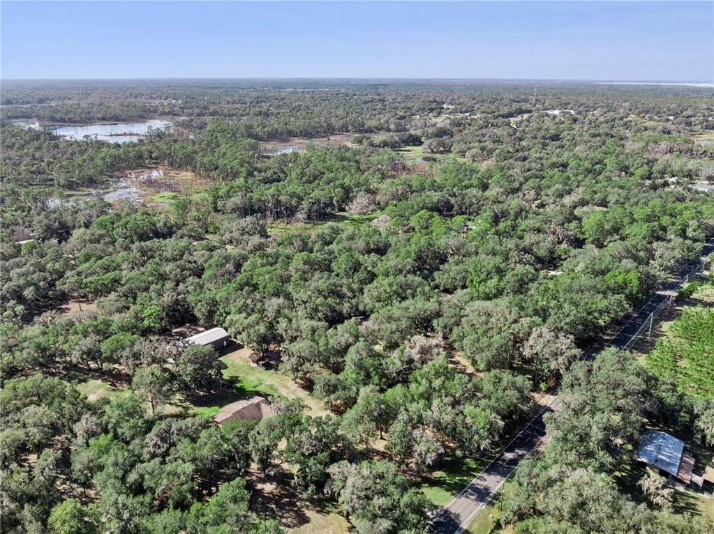 1001 Lake Harney Road Geneva, FL 32732 - Photo 30 of 34 an aerial view of a city with lots of residential buildings