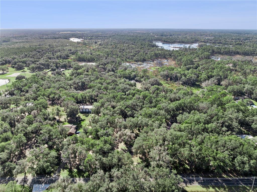 1001 Lake Harney Road Geneva, FL 32732 - Photo 31 of 34 an aerial view of a city with lots of residential buildings