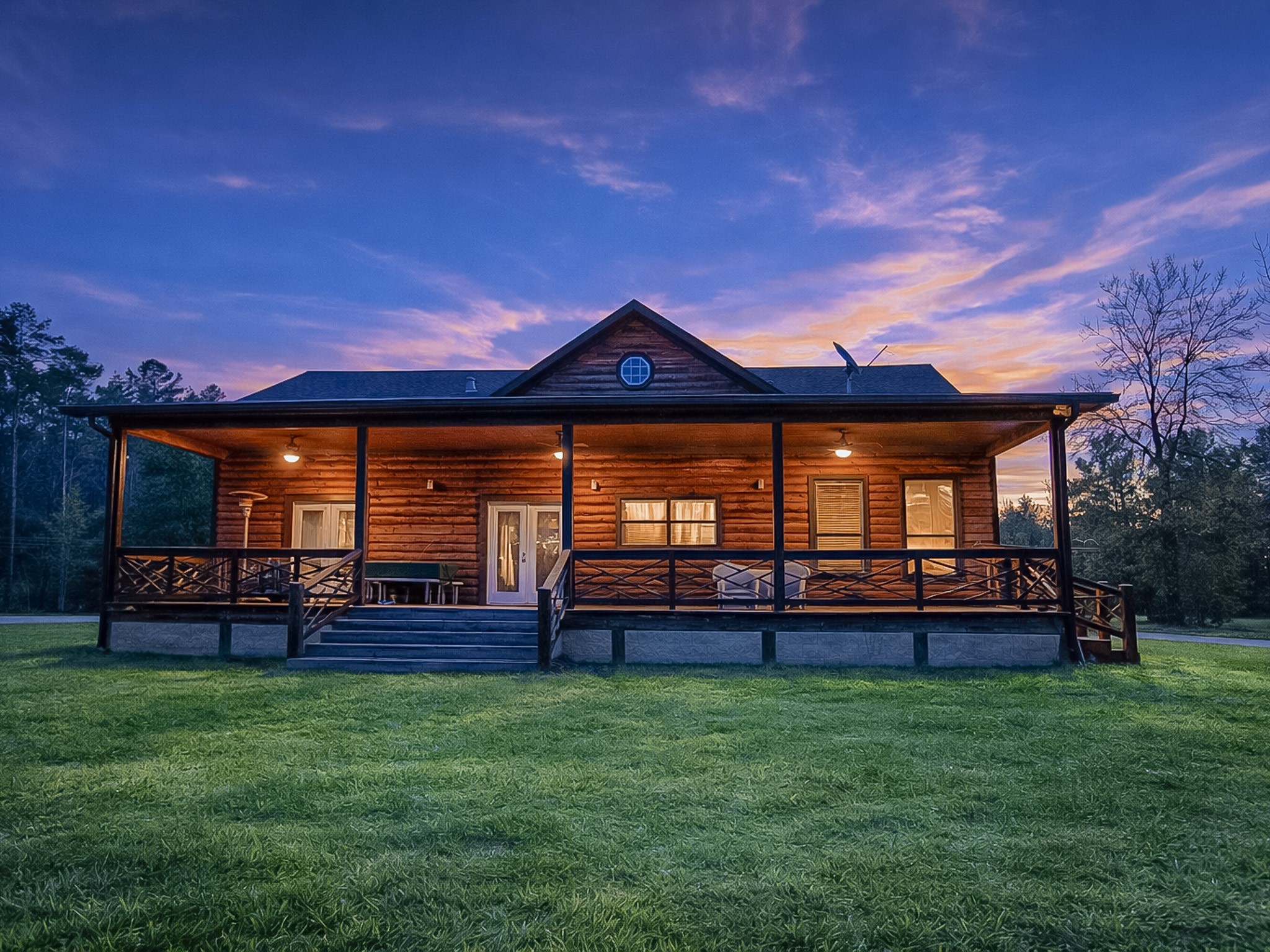 214 Hunters Hill Road Oakhurst, TX 77359 - Photo 21 of 29 front view of a house with a yard