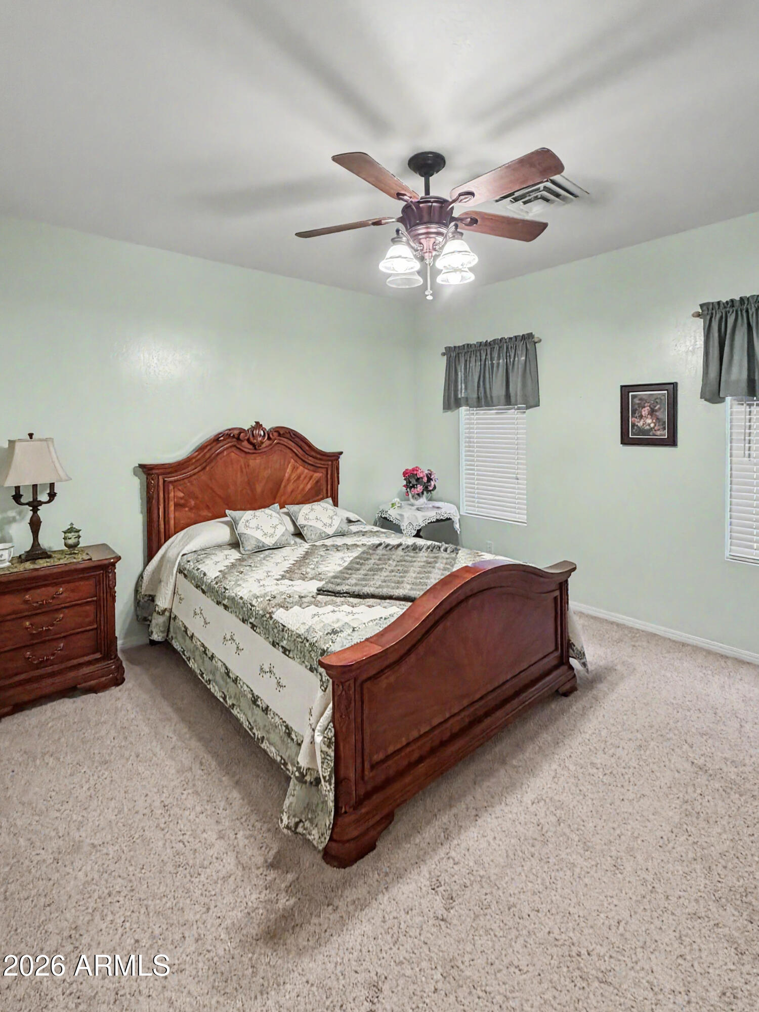 2980 Pine Rim Road Heber, AZ 85928 - Photo 13 of 14 a bedroom with a bed and ceiling fan