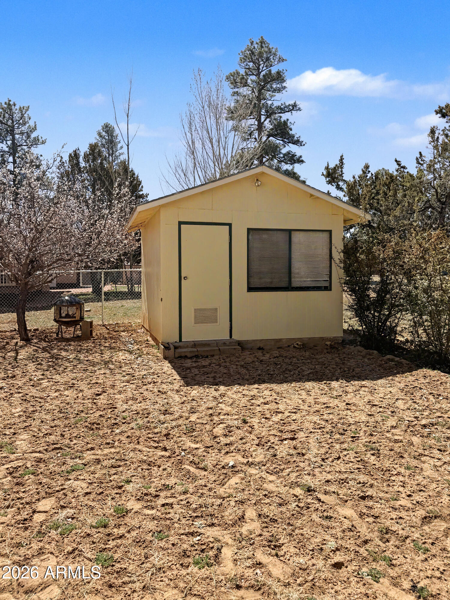 2980 Pine Rim Road Heber, AZ 85928 - Photo 5 of 14 a front view of a house with a yard