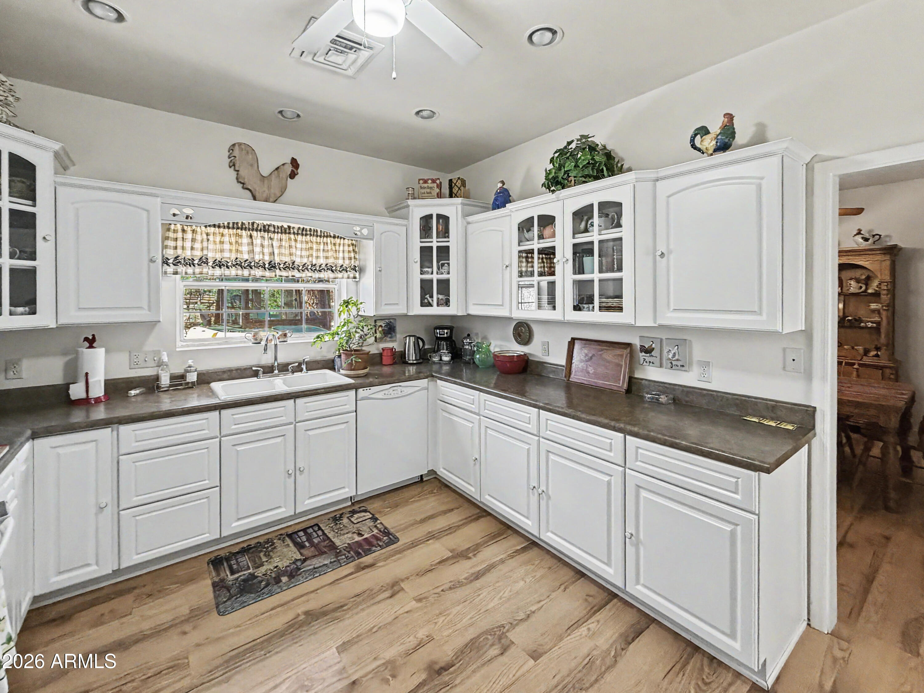 2980 Pine Rim Road Heber, AZ 85928 - Photo 7 of 14 a kitchen with a sink stove and cabinets