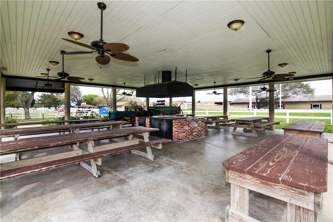 15990 Griffin Road Southwest Ranches, FL 33331 - Photo 16 of 20 a room with lots of tables and chairs
