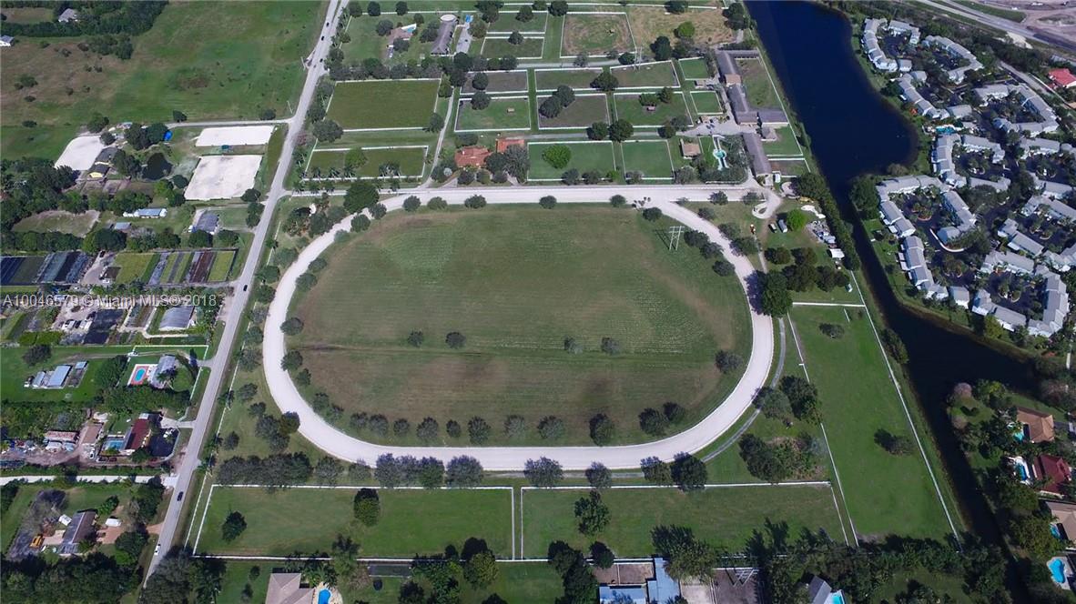15990 Griffin Road Southwest Ranches, FL 33331 - Photo 19 of 20 an aerial view of a house