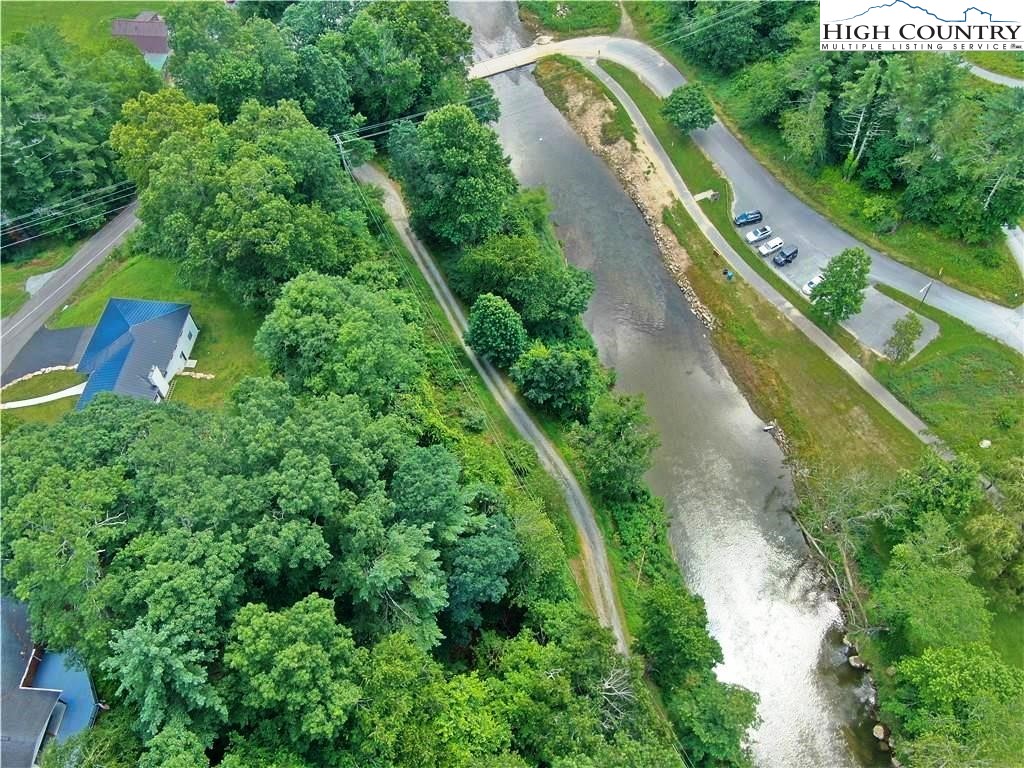 384 New River Heights Road Boone, NC 28607 - Photo 44 of 45 an aerial view of residential houses with outdoor space