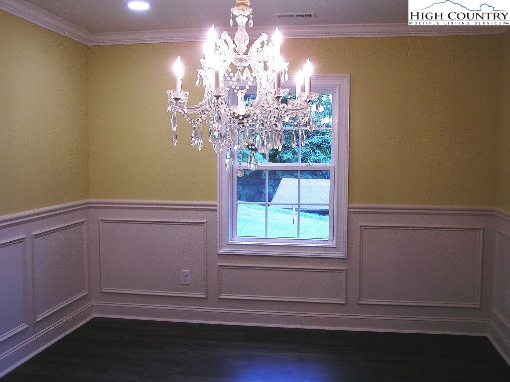 384 New River Heights Road Boone, NC 28607 - Photo 6 of 45 a view of a small space with a window