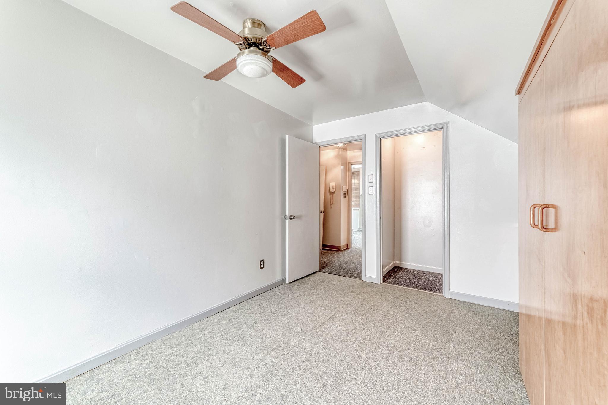 7207 Lavender Lane Springfield, VA 22150 - Photo 24 of 46 Upstairs Bedroom #1 (with custom built-ins)