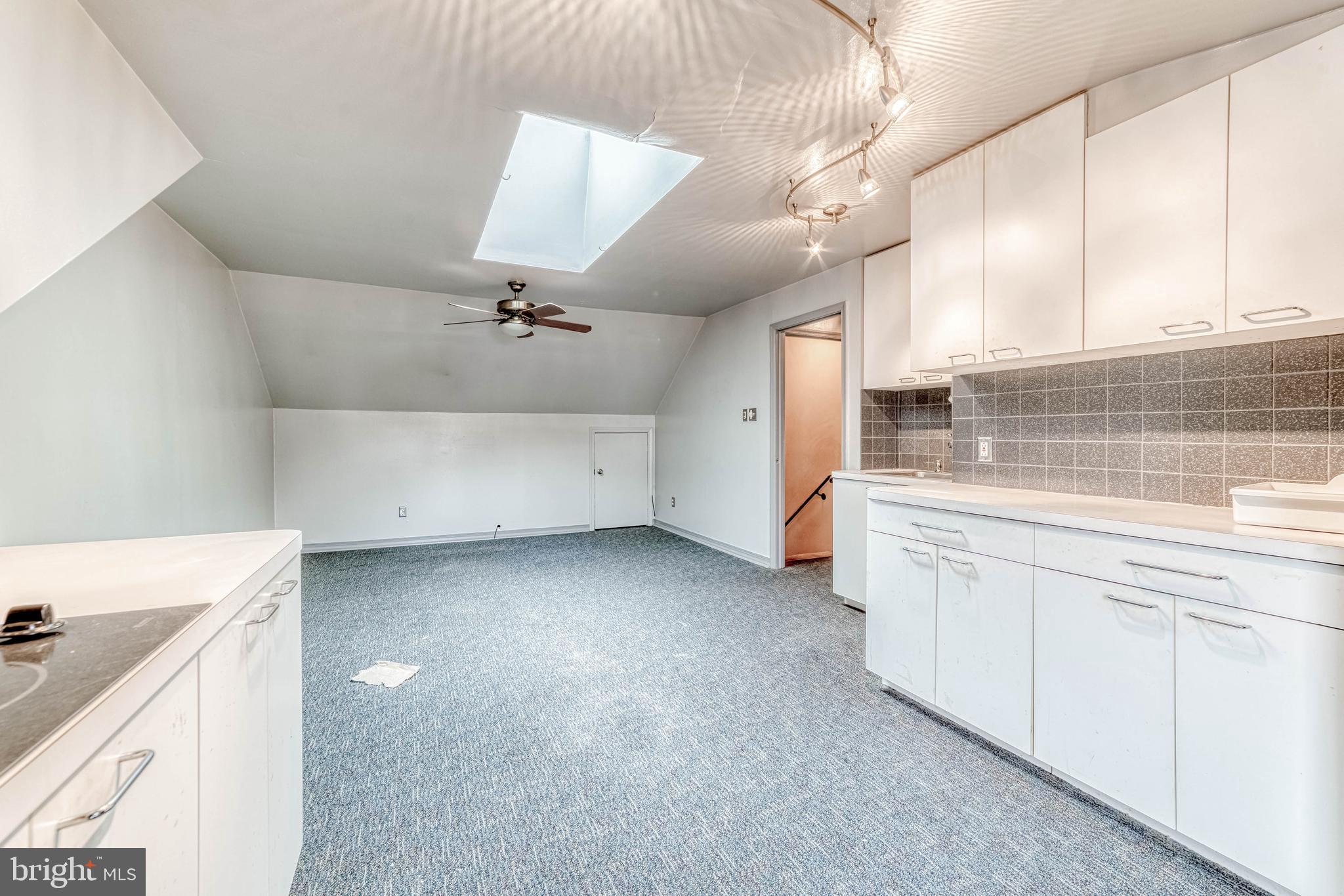 7207 Lavender Lane Springfield, VA 22150 - Photo 31 of 46 Upstairs Kitchen/Living Area/ Primary Bedroom#2