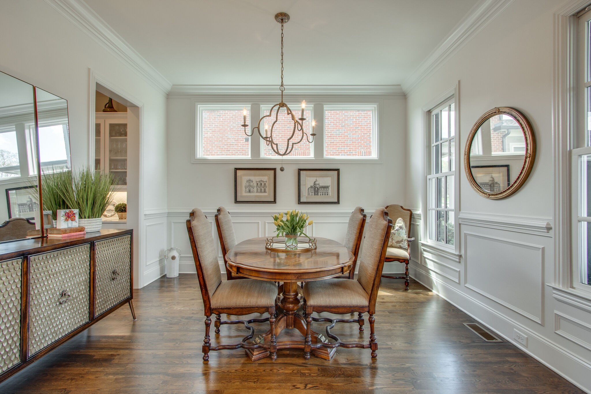 1606 Eliot Road Franklin, TN 37064 - Photo 14 of 67 a dining room with furniture a window and wooden floor