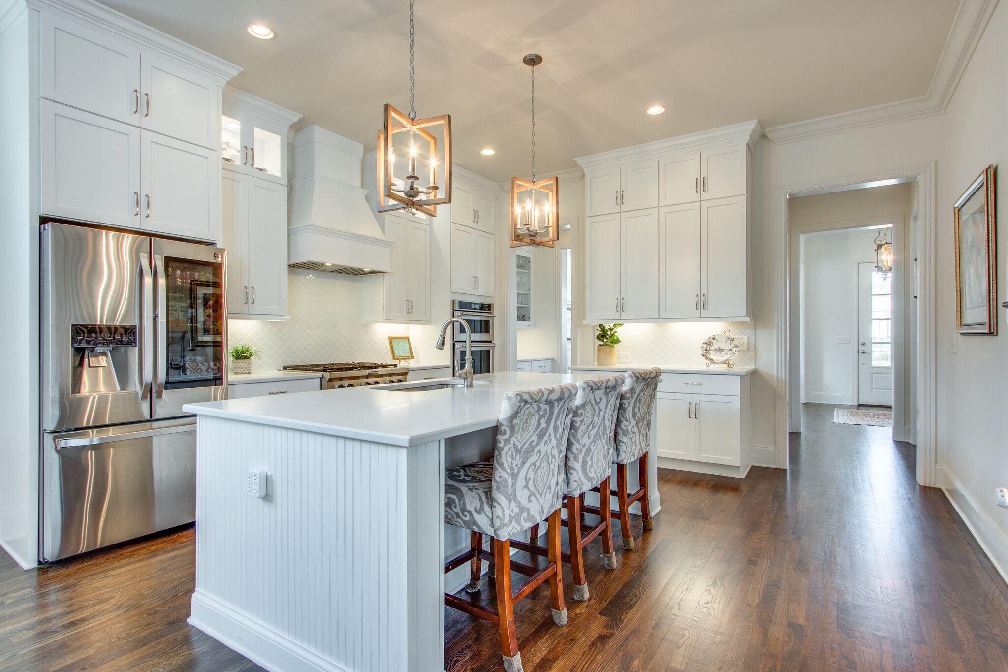 1606 Eliot Road Franklin, TN 37064 - Photo 17 of 67 a large kitchen with lots of counter space wooden floor and appliances