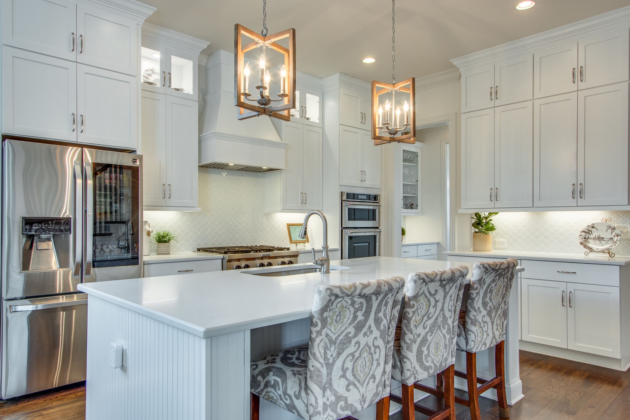 1606 Eliot Road Franklin, TN 37064 - Photo 18 of 67 a kitchen with stainless steel appliances granite countertop a stove refrigerator and cabinets