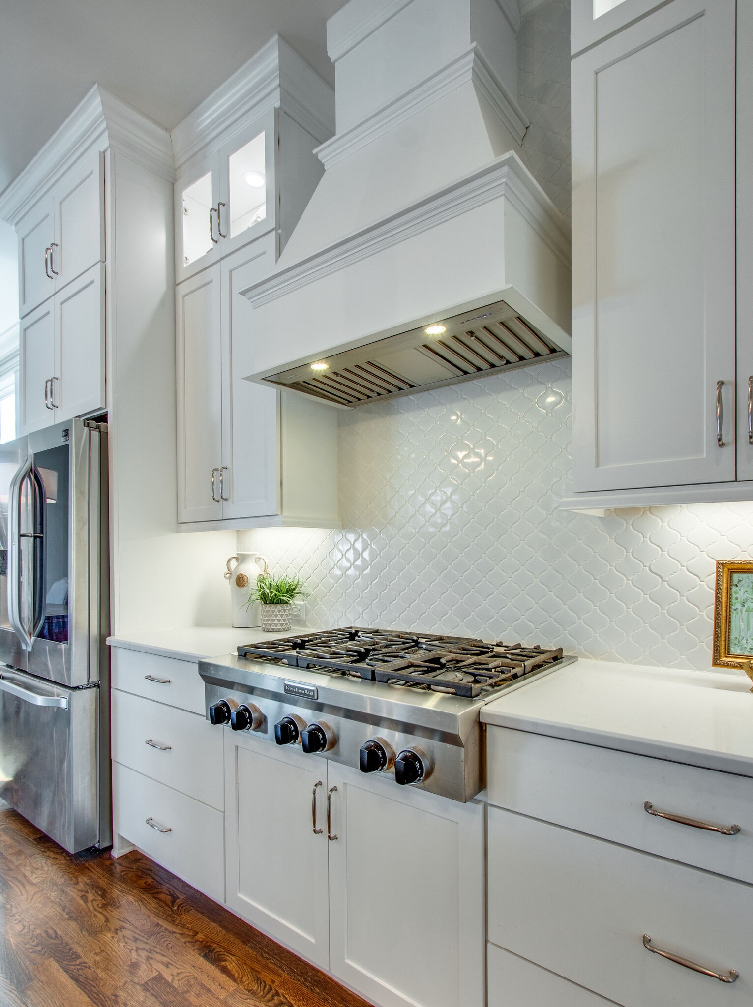 1606 Eliot Road Franklin, TN 37064 - Photo 20 of 67 a kitchen with stainless steel appliances granite countertop a stove and a refrigerator
