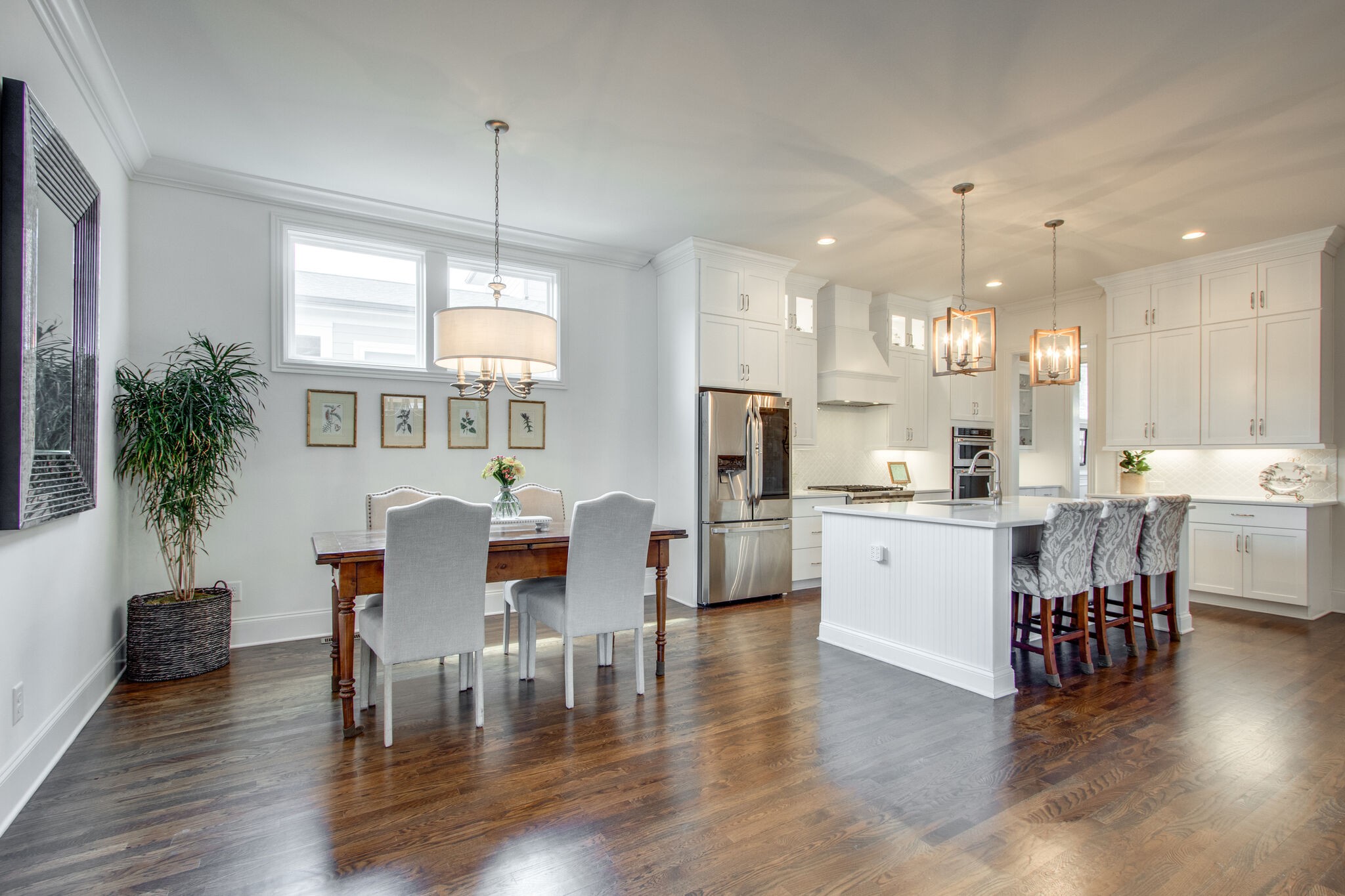 1606 Eliot Road Franklin, TN 37064 - Photo 24 of 67 a open kitchen with white cabinets and stainless steel appliances