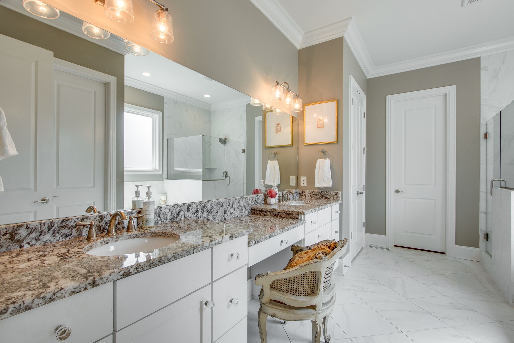 1606 Eliot Road Franklin, TN 37064 - Photo 30 of 67 a bathroom with a sink and a mirror