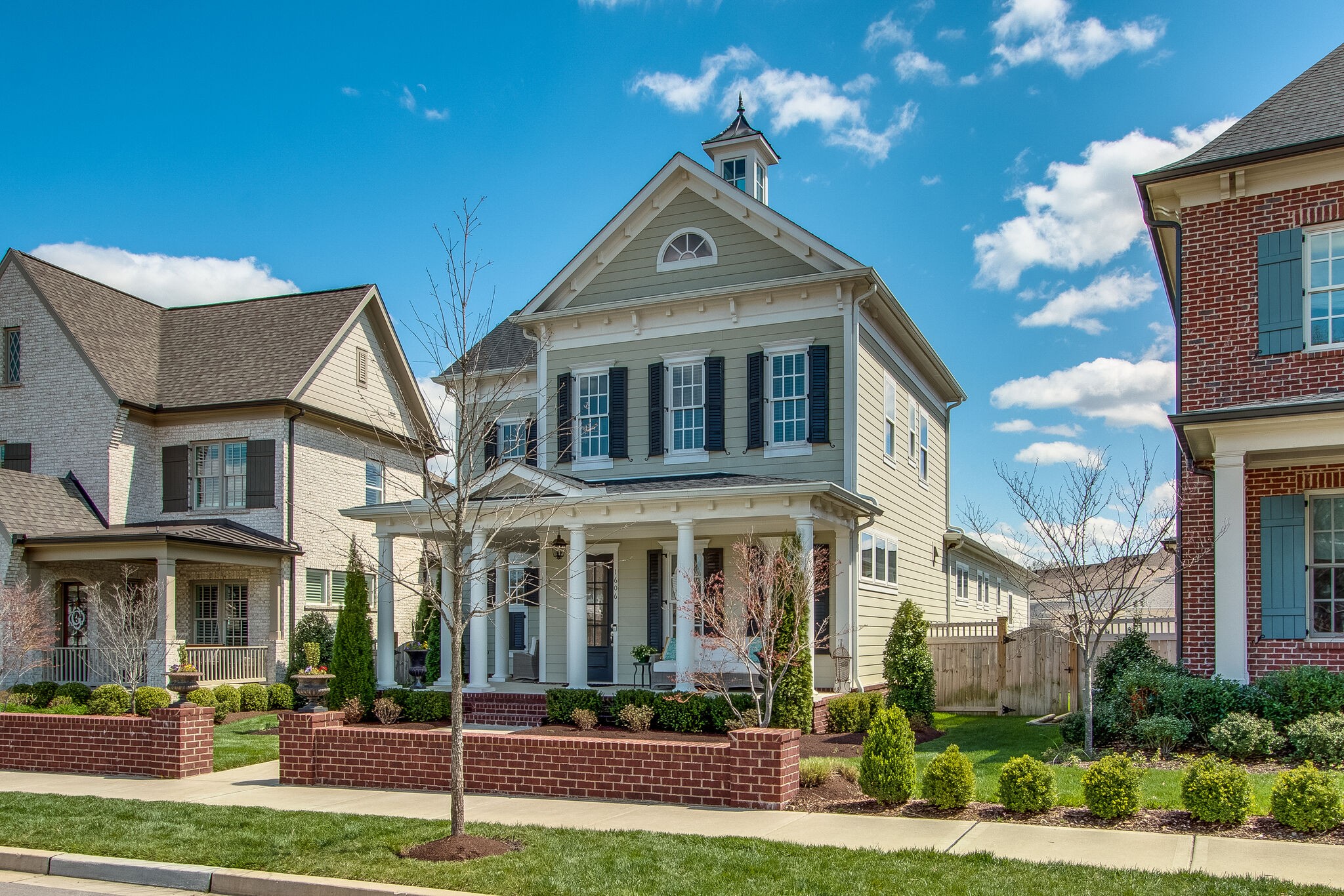 1606 Eliot Road Franklin, TN 37064 - Photo 3 of 67 a front view of a building with garden
