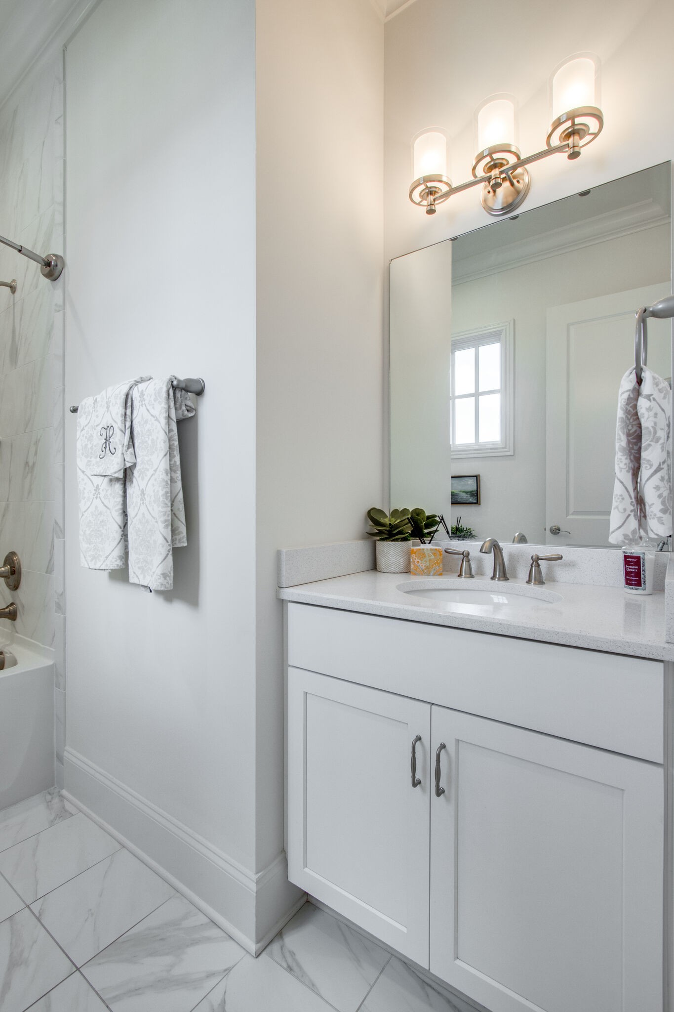 1606 Eliot Road Franklin, TN 37064 - Photo 38 of 67 a bathroom with a sink and a mirror