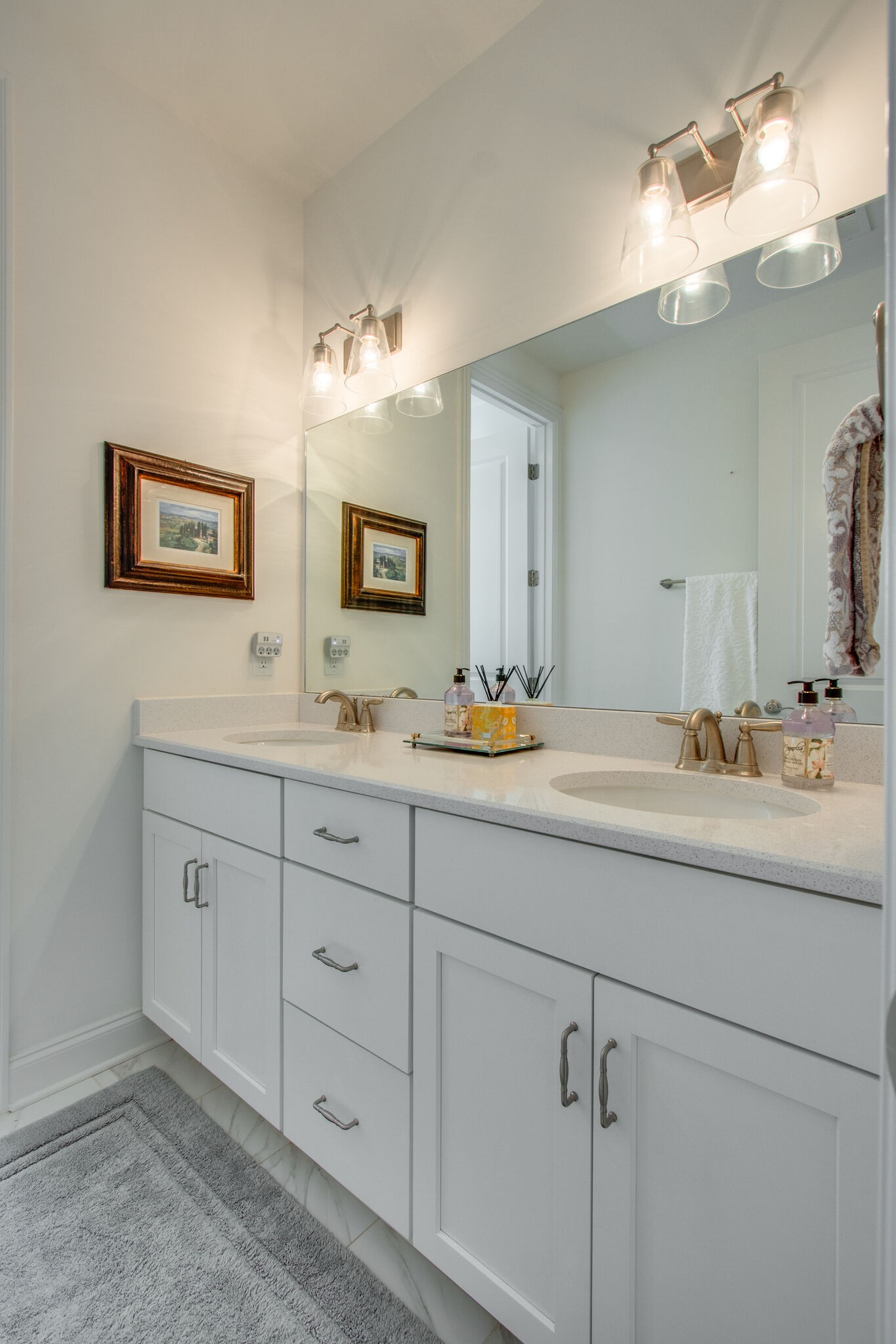 1606 Eliot Road Franklin, TN 37064 - Photo 46 of 67 a bathroom with double sink and a mirror