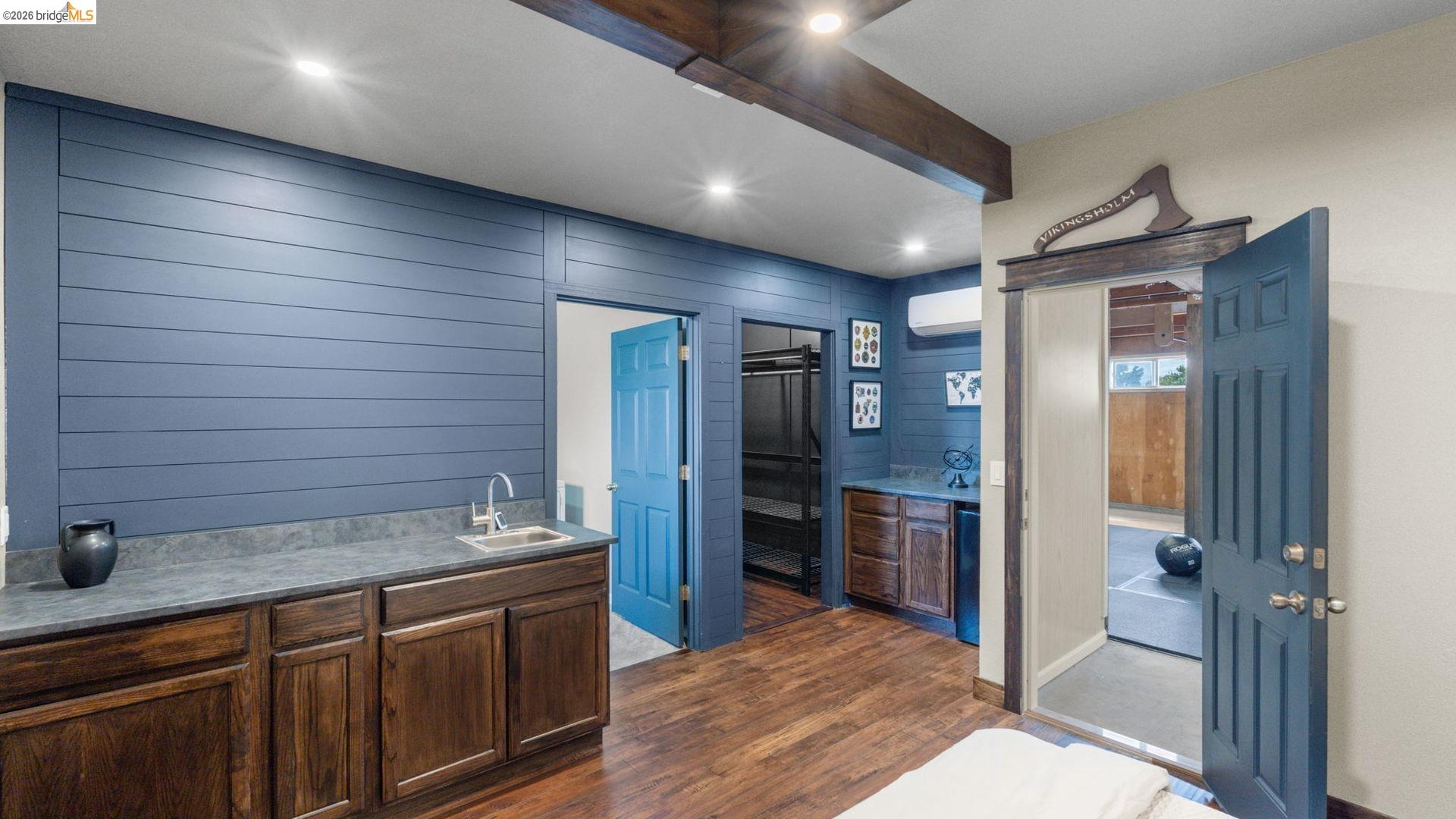 700 Brownstone Road Oakley, CA 94561 - Photo 48 of 58 Entertainment space featuring wood-finish flooring, exposed ceiling beams, and recessed lighting