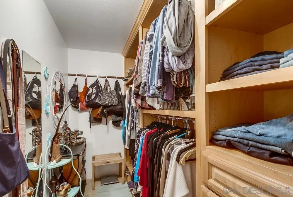 2548 Columbine Road Alpine, CA 91901 - Photo 32 of 71 a view of walk in closet with clothes and shoes