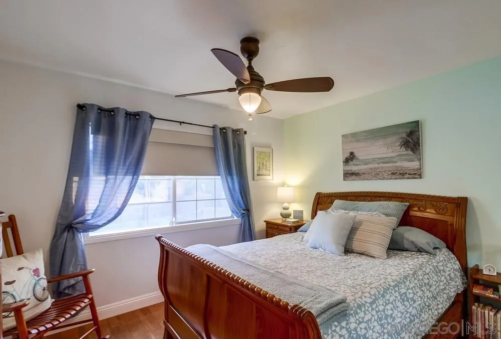 2548 Columbine Road Alpine, CA 91901 - Photo 33 of 71 a bedroom with a bed and a painting on the wall
