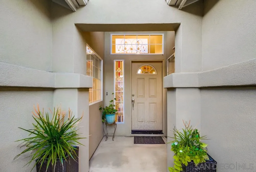 2548 Columbine Road Alpine, CA 91901 - Photo 4 of 71 a potted plant sitting in front of a door