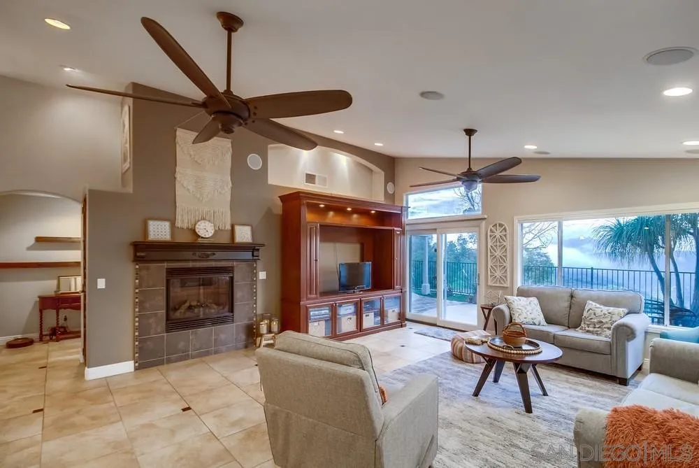 2548 Columbine Road Alpine, CA 91901 - Photo 7 of 71 a living room with furniture and a fireplace